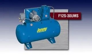 A blue jenny air compressor is sitting on a table A blue jenny air compressor is sitting on a table